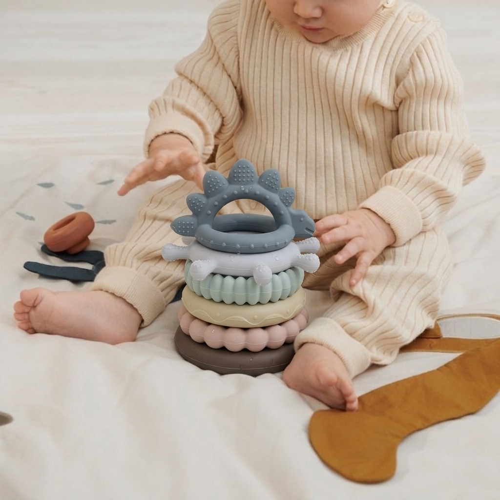 Baby playing with silicone sensory toys